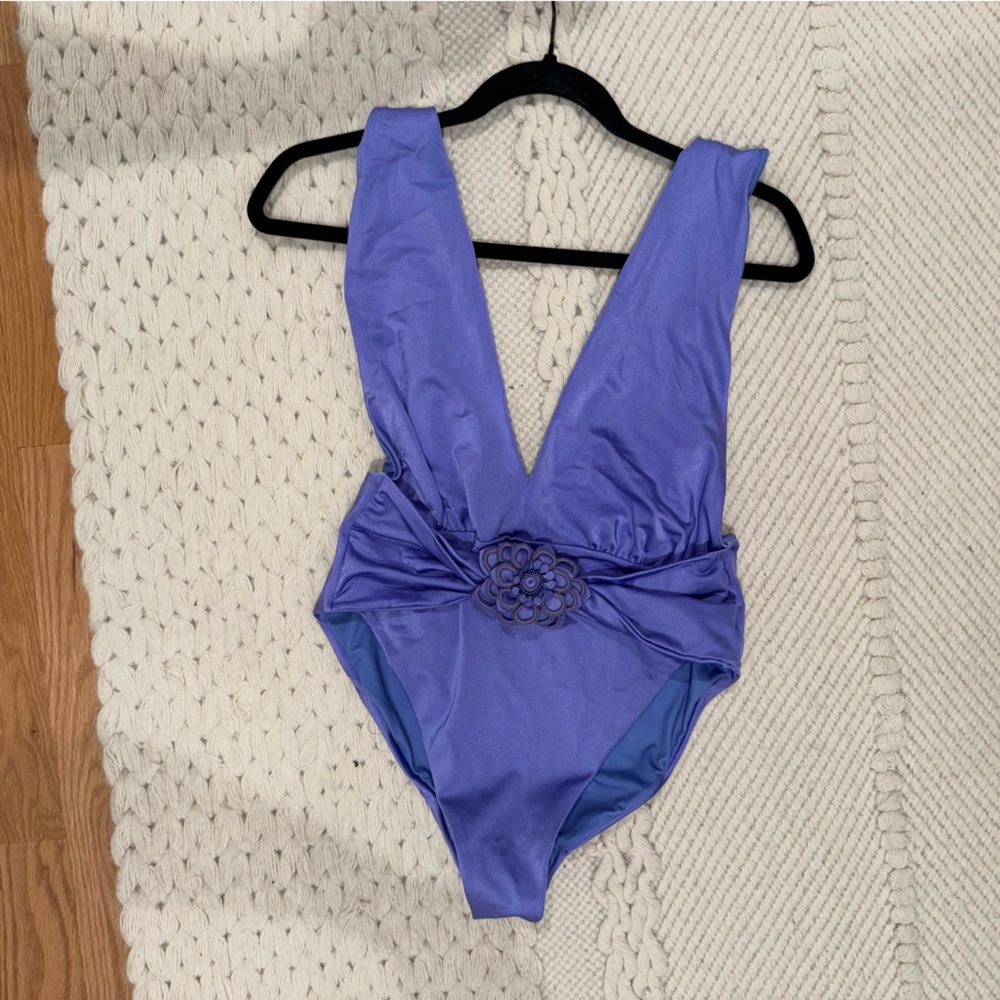 Gorgeous one-piece with floral accent
